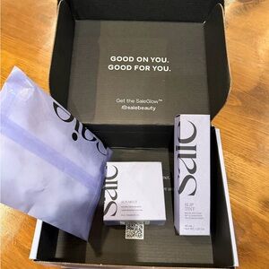 Saie duo Slip Tint Moisturizer 4 and Sun Melt Cream Bronzer Light Bronze